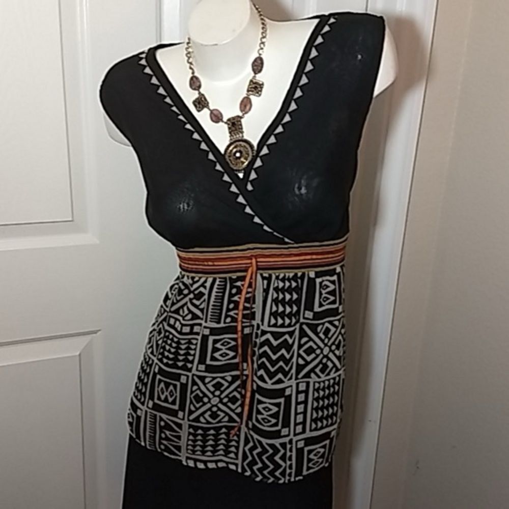 Luxe Black and Cream Geometric Blouse with Orange Accents